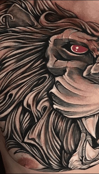 León tatuado en black and grey